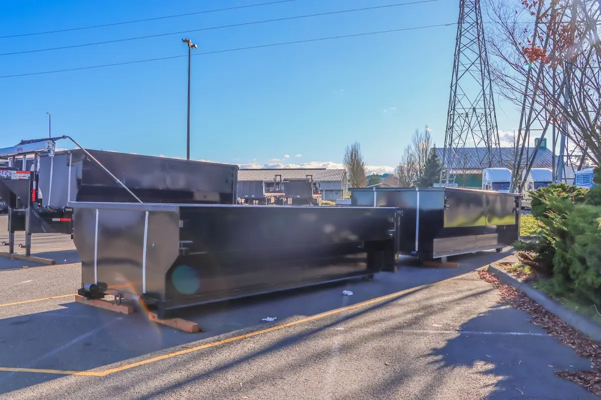 Roll-off dumpster ready for waste disposal at job site for Yard Waste Dumpster Rental in East Bethel